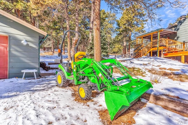 10829 Bartlett Trl, Rye, CO 81069 - snowy yard featuring a deck and stairs