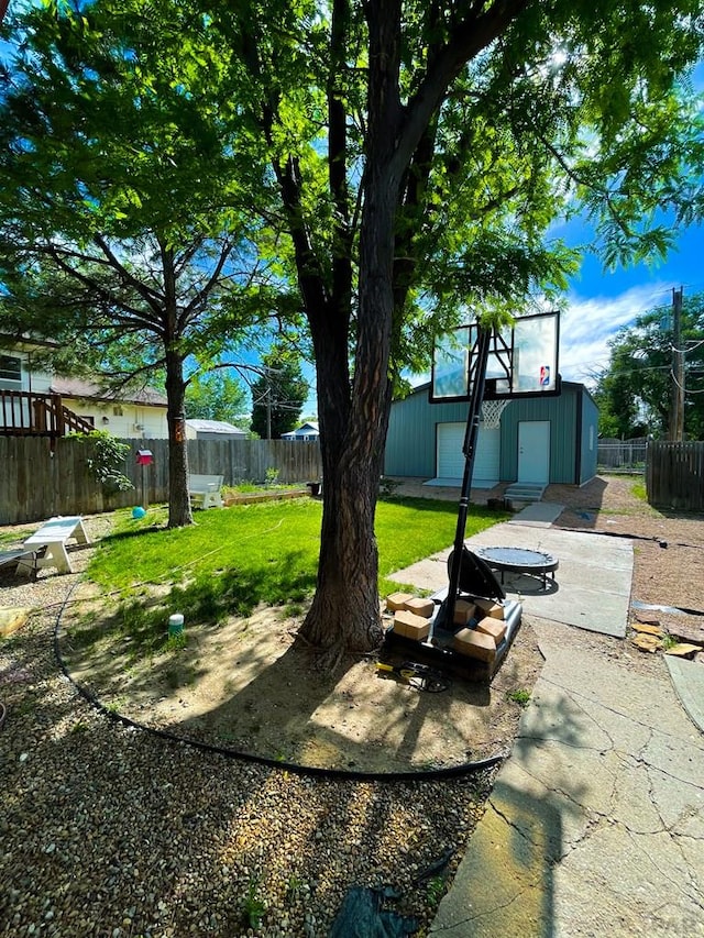 1320 Bradish Ave, La Junta, CO 81050 - view of yard featuring fence and an outbuilding