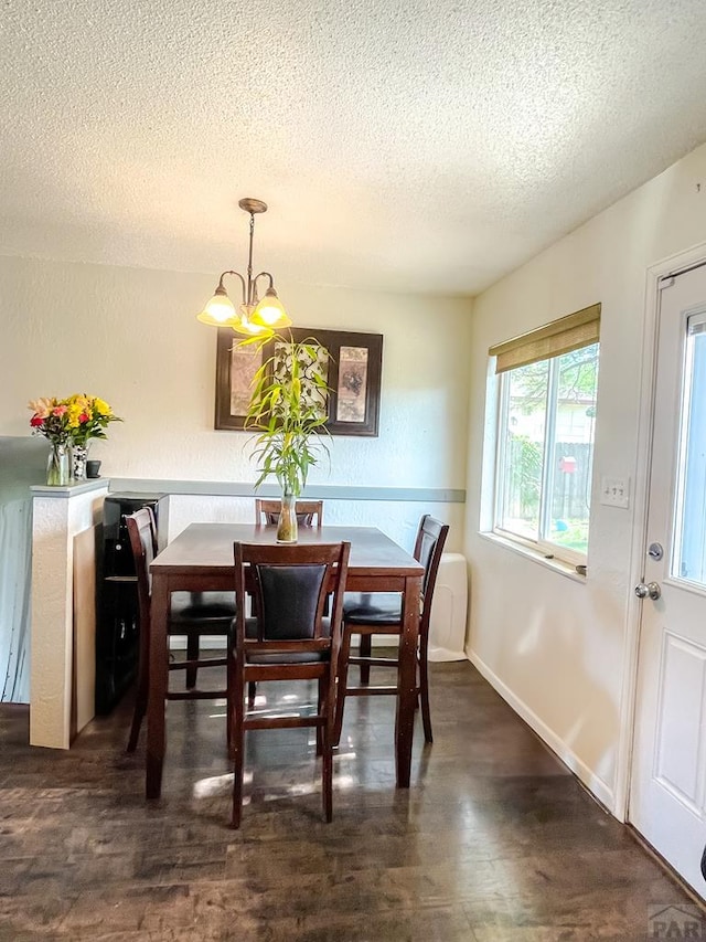 1320 Bradish Ave, La Junta, CO 81050 - dining area featuring a textured ceiling