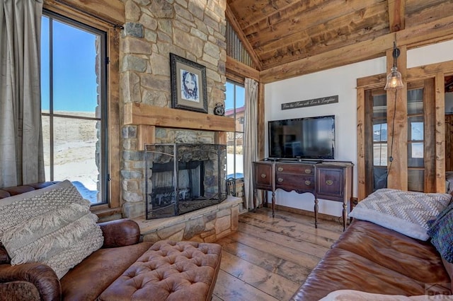1225 Brokenhand Rd, Westcliffe, CO 81252 - living room with hardwood / wood-style floors, wooden ceiling, plenty of natural light, and a fireplace