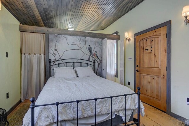 1225 Brokenhand Rd, Westcliffe, CO 81252 - bedroom featuring light wood-type flooring and wooden ceiling