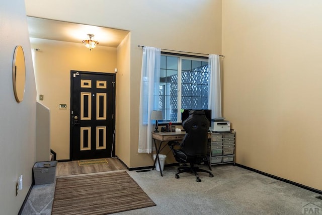 home office with carpet flooring and baseboards