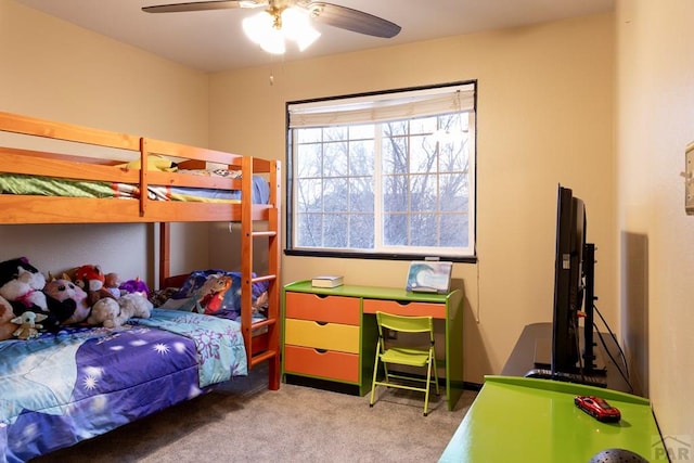 carpeted bedroom featuring a ceiling fan