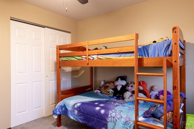 bedroom featuring a closet, carpet floors, and ceiling fan