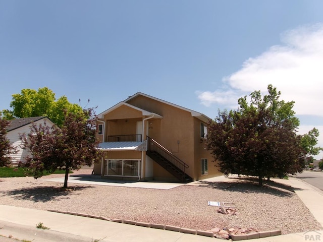 2110 Northmoor Ter Unit 2, Pueblo, CO 81001 - view of building exterior featuring stairs