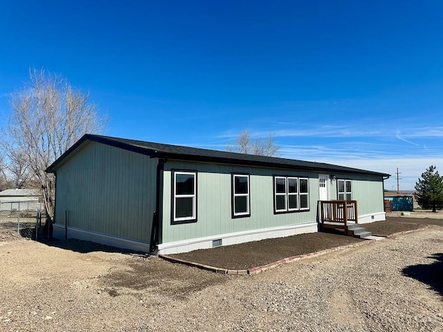 exterior space with crawl space