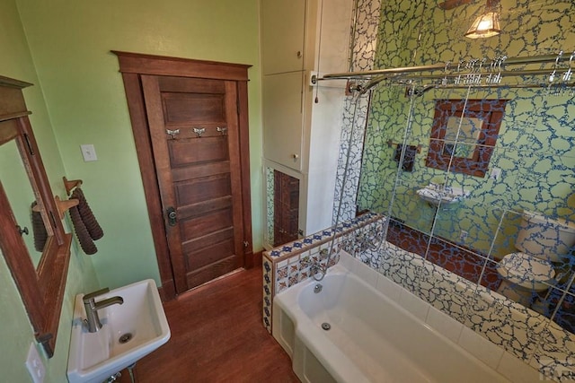 315 S Oak St, Trinidad, CO 81082 - full bathroom with a bath, wood finished floors, and a sink