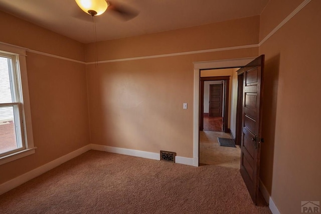315 S Oak St, Trinidad, CO 81082 - carpeted empty room featuring baseboards