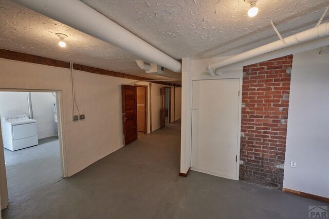 315 S Oak St, Trinidad, CO 81082 - finished below grade area featuring washer / dryer and a textured ceiling