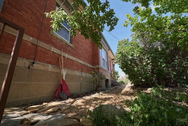 315 S Oak St, Trinidad, CO 81082 - view of side of home featuring brick siding