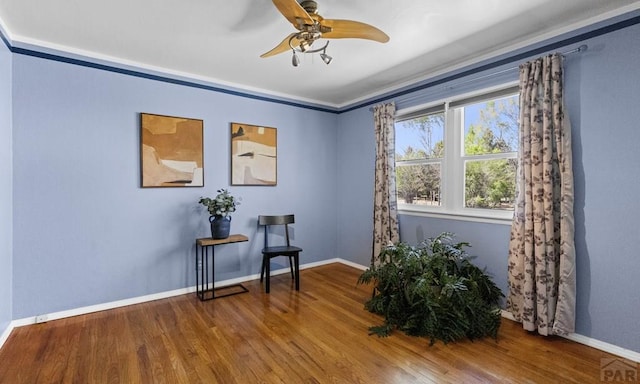 4321 Goodnight Ave, Pueblo, CO 81005 - living area with ceiling fan, baseboards, and wood finished floors