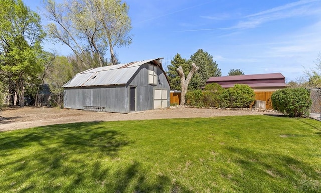 4321 Goodnight Ave, Pueblo, CO 81005 - view of barn featuring a lawn and fence