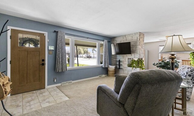 4321 Goodnight Ave, Pueblo, CO 81005 - carpeted living area with baseboards and visible vents