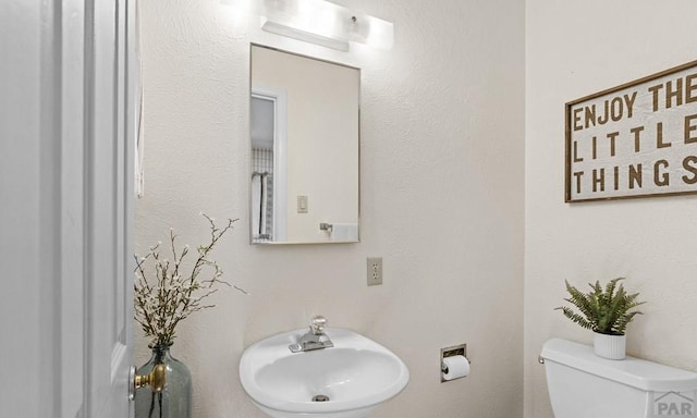 4321 Goodnight Ave, Pueblo, CO 81005 - half bathroom with a sink and toilet