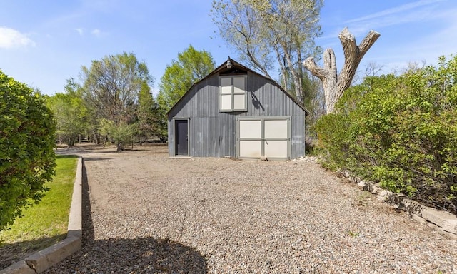 4321 Goodnight Ave, Pueblo, CO 81005 - view of barn featuring gravel driveway