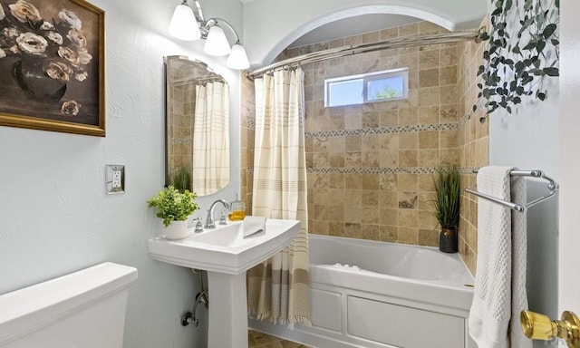 4321 Goodnight Ave, Pueblo, CO 81005 - bathroom with shower / bath combination with curtain and toilet