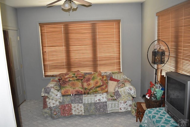 living room featuring ceiling fan