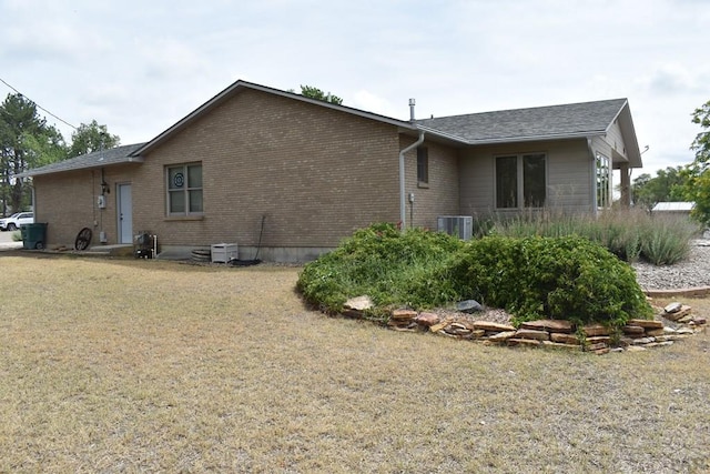 exterior space featuring brick siding
