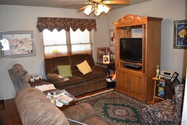 living room featuring wood finished floors and a ceiling fan