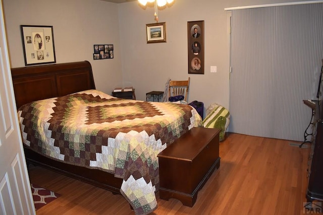 bedroom featuring light wood-type flooring