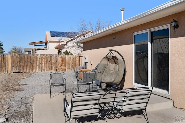 view of patio / terrace with fence