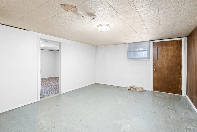 basement featuring tile patterned floors