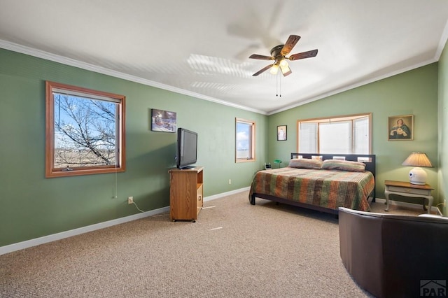 bedroom with crown molding, lofted ceiling, light carpet, ceiling fan, and baseboards