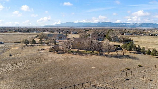 mountain view featuring a rural view