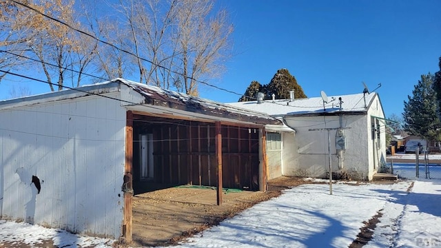 view of snow covered property