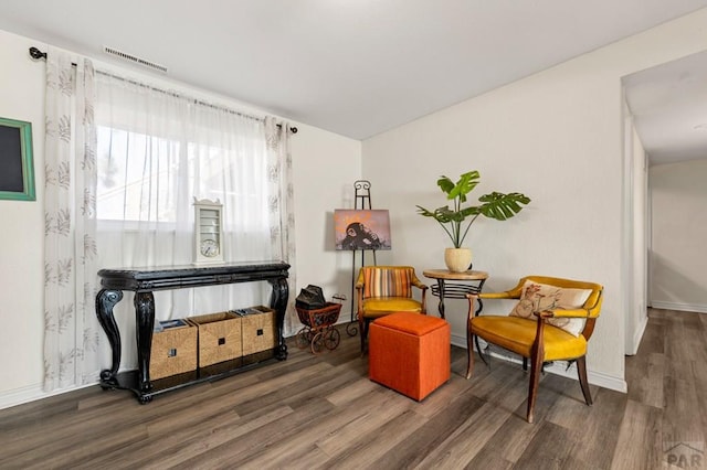 40 Macalester Rd, Pueblo, CO 81001 - sitting room with wood finished floors and baseboards