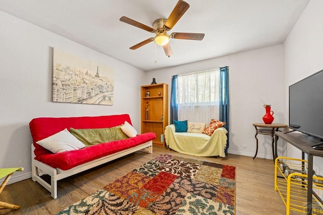 40 Macalester Rd, Pueblo, CO 81001 - living area featuring a ceiling fan, wood finished floors, and baseboards