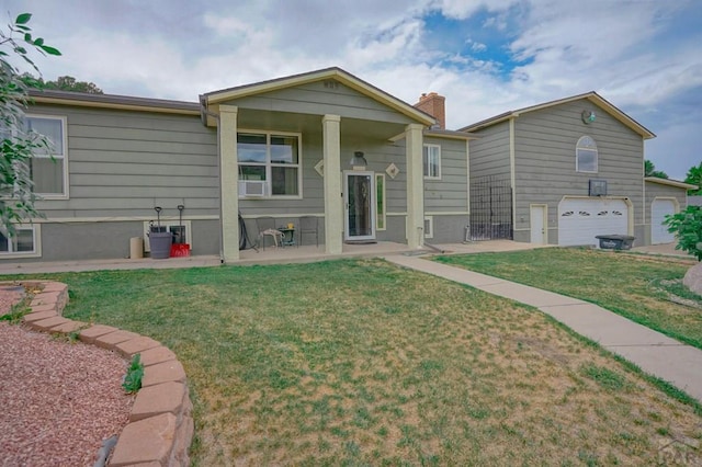 view of front of home featuring a chimney and a front lawn