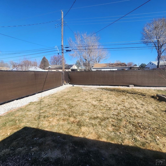 view of yard with fence