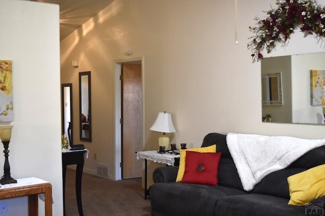 living area with carpet floors and visible vents