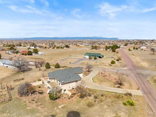 aerial view with a desert view, a rural view, and a mountain view