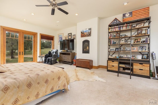 carpeted bedroom featuring access to outside, french doors, baseboards, and recessed lighting