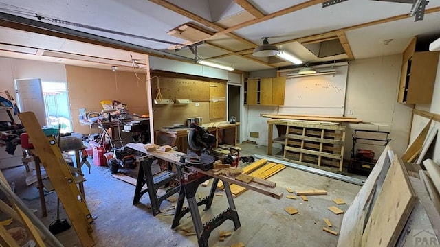 1728 Euclid Ave, Pueblo, CO 81004 - miscellaneous room featuring a workshop area and a garage
