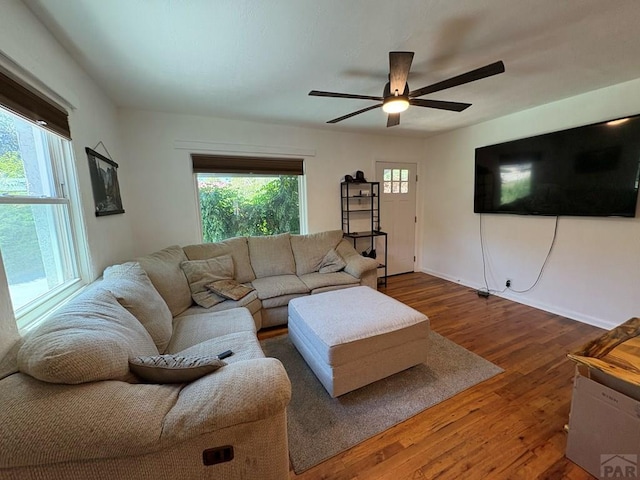 1728 Euclid Ave, Pueblo, CO 81004 - living area with a ceiling fan and wood finished floors
