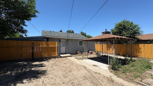 1728 Euclid Ave, Pueblo, CO 81004 - back of house featuring a gazebo and stucco siding