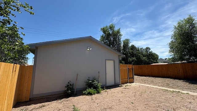 1728 Euclid Ave, Pueblo, CO 81004 - view of home's exterior featuring a fenced backyard and an outbuilding