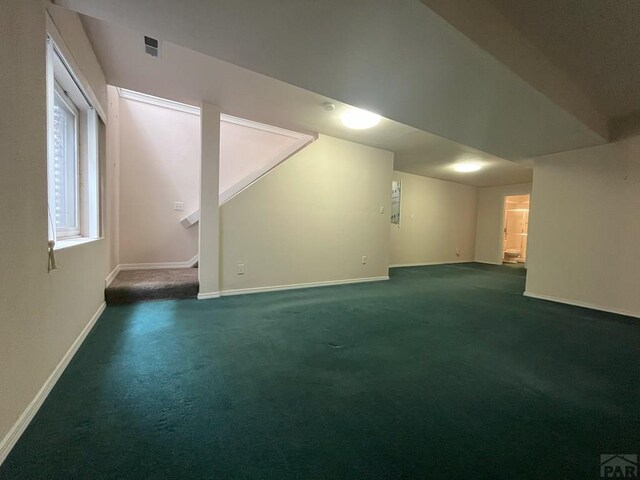 165 Kingsley Ave Unit M, Pueblo, CO 81005 - below grade area with carpet flooring and baseboards