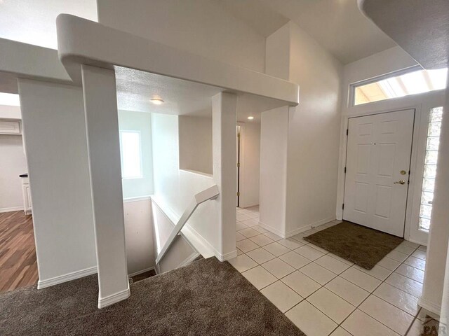 165 Kingsley Ave Unit M, Pueblo, CO 81005 - foyer featuring healthy amount of natural light, baseboards, and light tile patterned flooring