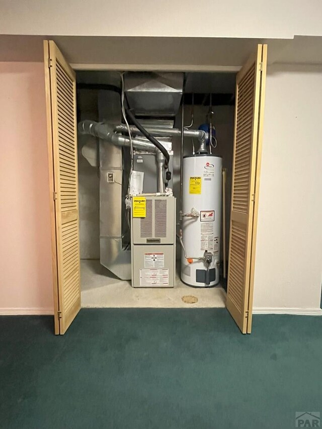 165 Kingsley Ave Unit M, Pueblo, CO 81005 - utility room with gas water heater