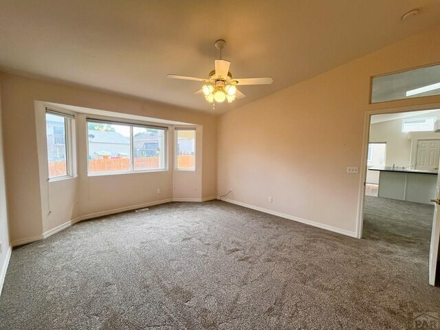 165 Kingsley Ave Unit M, Pueblo, CO 81005 - carpeted spare room featuring a ceiling fan and baseboards