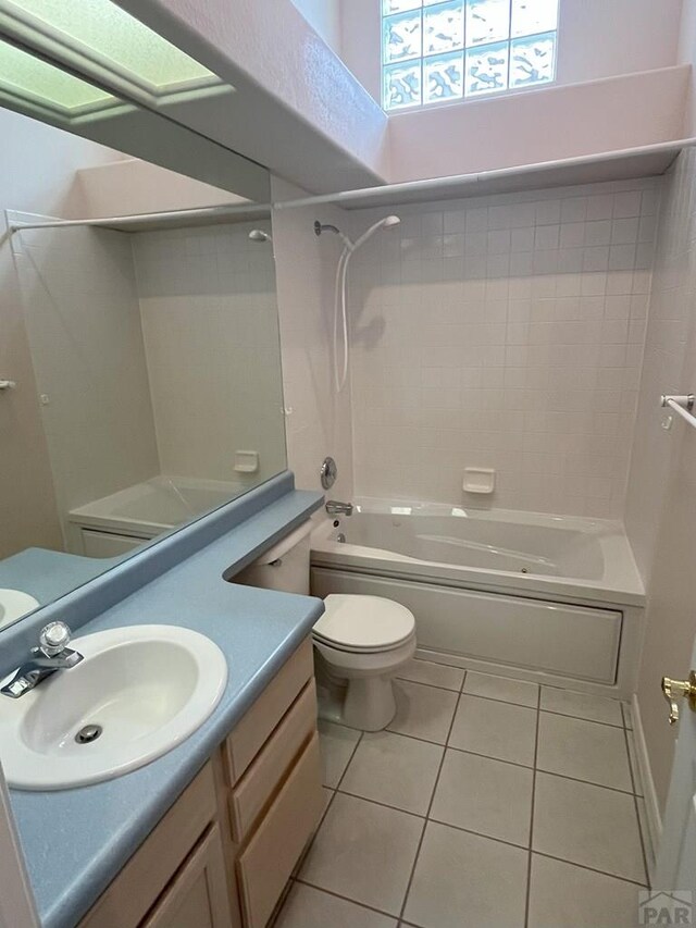 165 Kingsley Ave Unit M, Pueblo, CO 81005 - bathroom with tile patterned flooring, toilet, bathtub / shower combination, and vanity