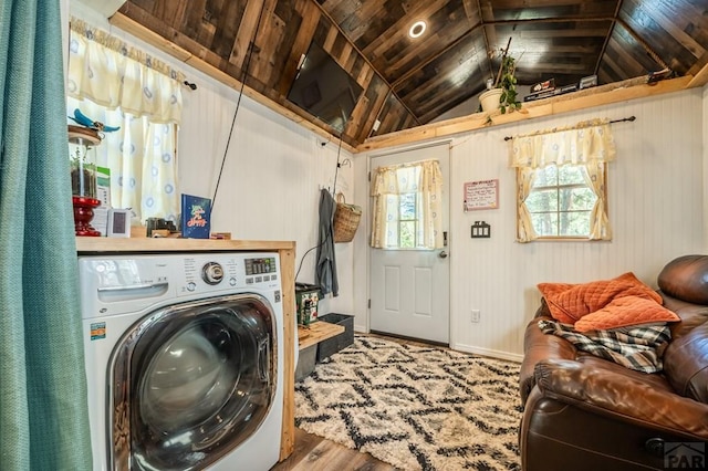 9016 Pine Ave, Beulah, CO 81023 - clothes washing area featuring washer / clothes dryer, baseboards, laundry area, wood ceiling, and wood finished floors
