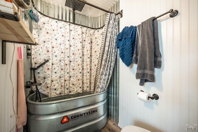 9016 Pine Ave, Beulah, CO 81023 - bathroom with toilet and a shower with shower curtain