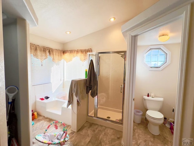 full bath featuring recessed lighting, lofted ceiling, toilet, a stall shower, and a bath