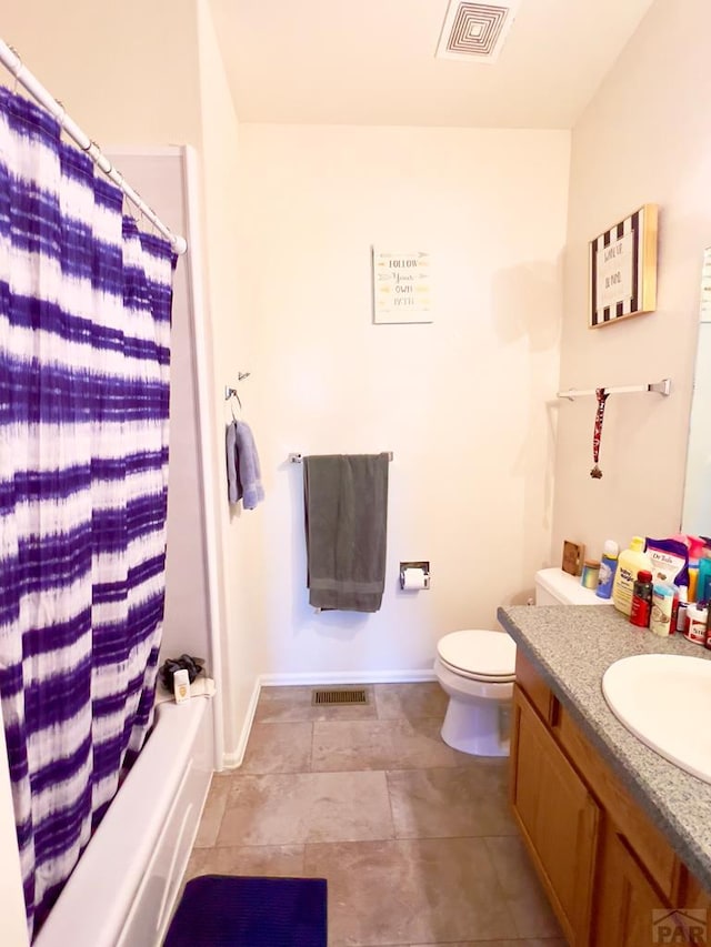 full bath featuring toilet, vanity, shower / bath combo with shower curtain, and visible vents