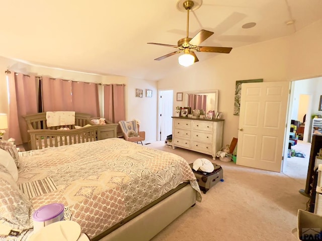 bedroom featuring lofted ceiling, light carpet, and ceiling fan